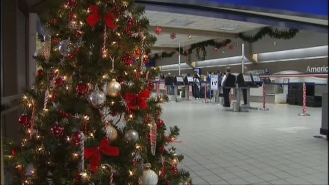 Holiday travelers are headed to the airport to create sweet reunions.
