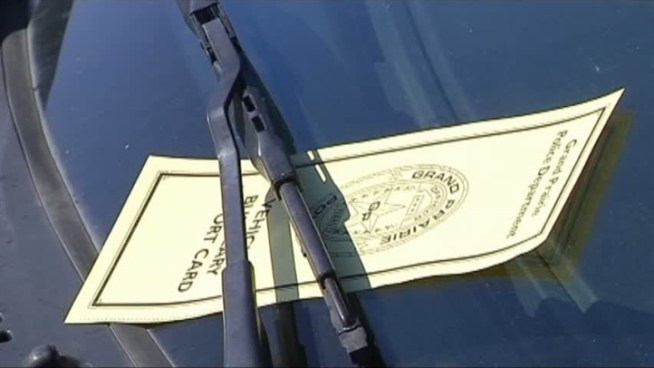 Park in Grand Prairie?  You may get a report card.