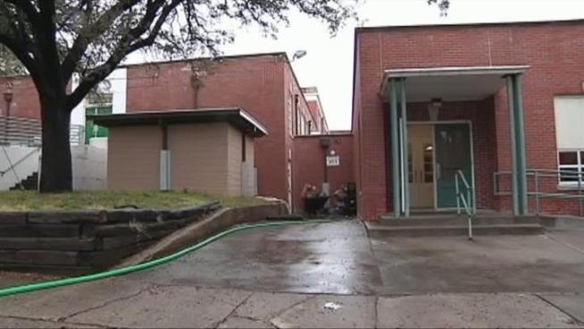 Water flooded the kitchen of Fort Worth's South Hi Mount Elementary on Tuesday, leaving workers -- and neighbors -- to fight rising water.