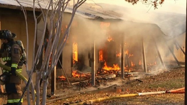 A private college prep school in Denton will be closed Thursday and Friday after a 2-alarm fire damaged the campus Thursday morning.