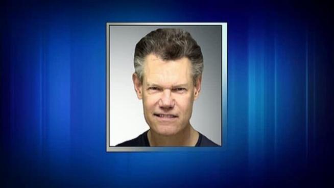 Country singer Randy Travis was arrested for public intoxication in Sanger, TX.
