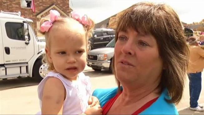 Forney tornado destroyed one woman's home, but she and three small children got out alive.