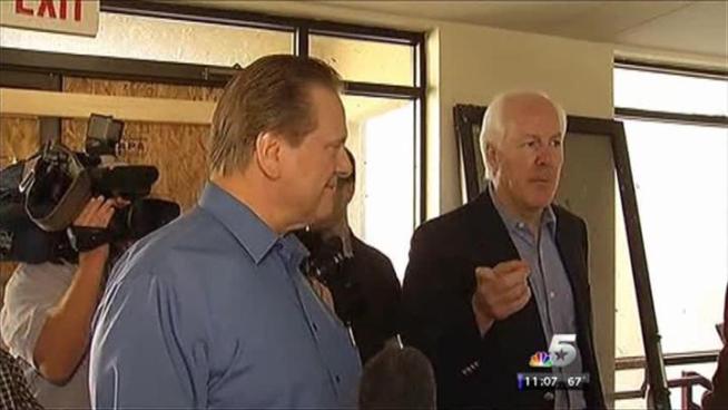 U.S. Sen. John Cornyn and Arlington Mayor Robert Cluck toured the damaged areas of Arlington on Friday.