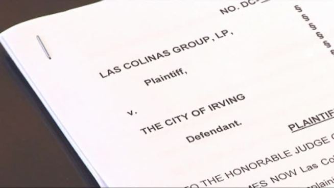 Irving faces a lawsuit from the Las Colinas Group after the City Council voted 5-4 to decline a contract extension for the proposed Irving entertainment center.