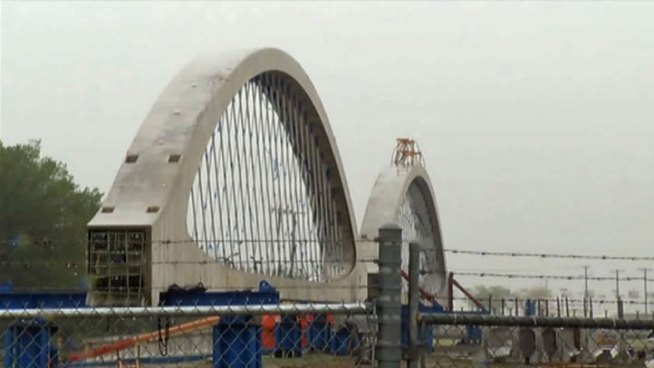The arches for the West 7th Street bridge replacement are taking shape, but construction delays and detours won't begin for another six months or so.