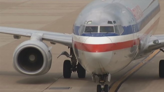 Pilots at American Airlines are approving a new labor contract, which could clear the way for consideration of a merger with US Airways.
