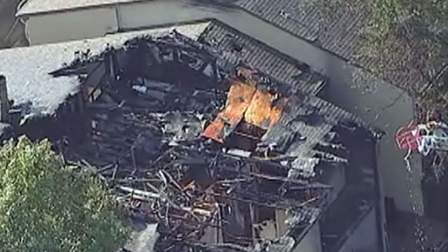 Fire crews fought a massive apartment fire a few blocks from Addison Airport on Friday afternoon.