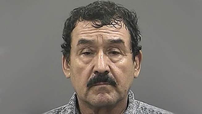 Police say 62-year-old Ambrocio Mata was caught twice with a boy, first in a locked janitor's closet by another janitor, and later in a classroom by yet another janitor.