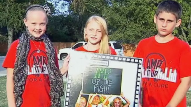 Audrey, Megan and Preston formed Amp It Up for the Cure and their team raised $11,000 for type 1 diabetes research during the Juvenile Diabetes Research Foundation walk over the weekend.