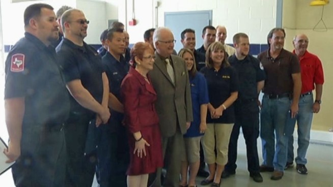 The Arlington Fire Department honored citizens Gordon Starr, Mark Morgello, Gina Martinez, and Alison Dolezal who assisted Arlington EMS professionals in saving the life of Paul Davis who suffered a heart attack at a Kwik Kar Lube on Matlock Road.