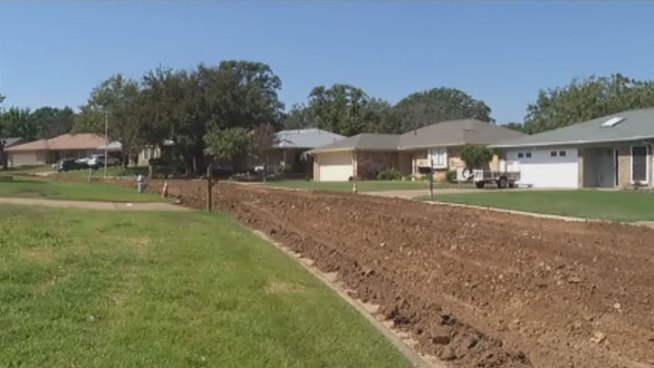Construction crews tore up French Wood Drive in Arlington with a plan to repave the street but that afternoon a tornado tore through the neighborhood. Six months later the road work still needs to be done.