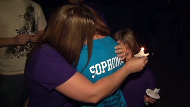Hundreds of people attended a candlelight vigil in memory of a 15-year-old Rockwall girl who was fatally stabbed in her home.