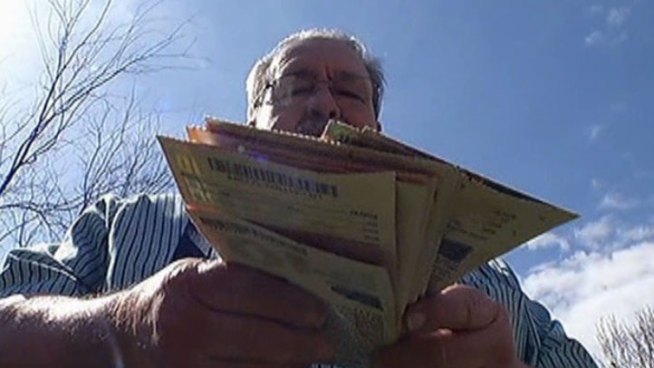 James Clay wins big after buying a scratch off lottery ticket in Irving.