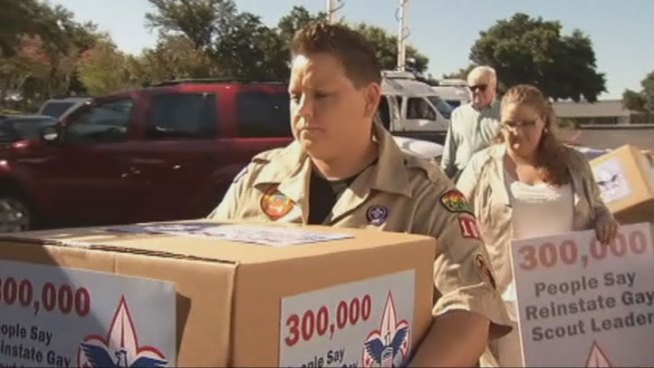 Jennifer Tyrrell, ousted as a den leader because she is a lesbian, delivered a petition with 300,000 signatures to the Boy Scouts of America headquarters urging the Dallas-based organization to reinstate her.