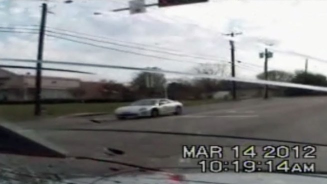 Dashcam from Carrollton Police Officer Matt Bonner's police cruiser shows he ran a red light. NBC 5 video shows the scene March 14 after the accident that left Bonner injured.