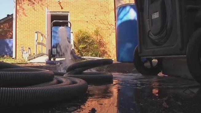 A water main break in the 4300 block of Miller Avenue flooded homes and a church and during cleanup and repairs talk turned to who is to blame for all the damage.