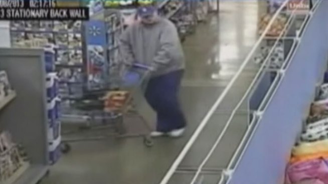 Dallas police released a new surveillance video they hope will help them find a person of interest in the case of a Lake Highlands woman killed in her home.