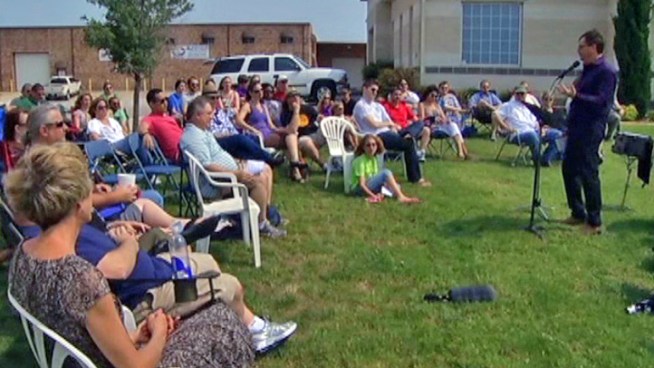 The 100-member Crosspointe Church congregation gathered for services Sunday a few feet from their building four days after lightning destroyed it.