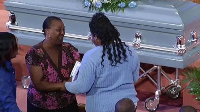 The mother of one of the kids accused of pushing Octavius Lanier at the MLK DART station made an emotional apology during his funeral.
