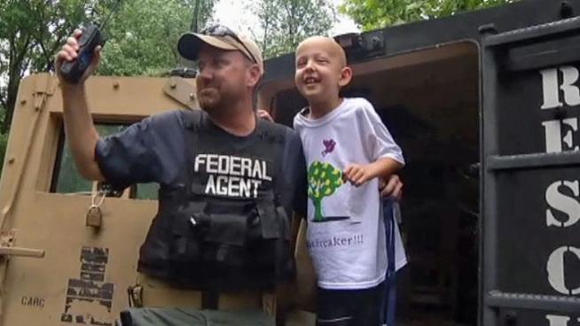 Multiple law enforcement and government agencies join a cancer-stricken 6-year-old Michael Malone on a play date he will never forget.