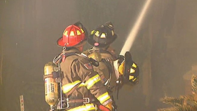Fire was shooting through the roof when firefighters arrived at the home in the 3600 block of Orchid Lane. Four other departments from Pantego, Arlington, Forest Hill and Kennedale, helped fight the fire.