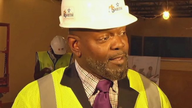 Former Dallas Cowboy Emmitt Smith lead a tour of The Salvation Army Youth Education Town, a legacy project of Super Bowl XLV, which is nearing completion for a September opening.
