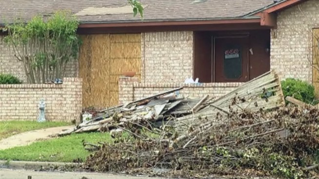 Federal Emergency Management Agency combed through the damage zone in Arlington Monday, the tornado damage stretches from south of State High 287 all the way north to Lake Arlington.