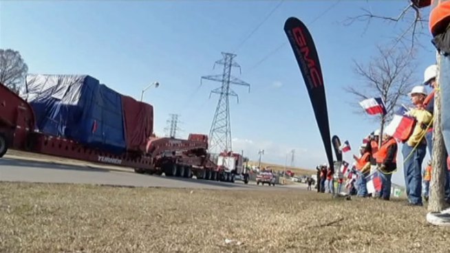 The first pieces of equipment for General Motors' new stamping facility arrived at the Arlington assembly plant Friday.