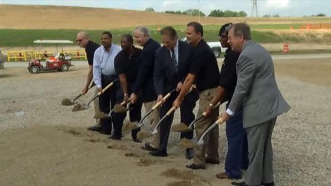 General Motors broke ground on a new stamping facility in Arlington the latest move in expansion that will keep sport utility vehicles rolling off the line.