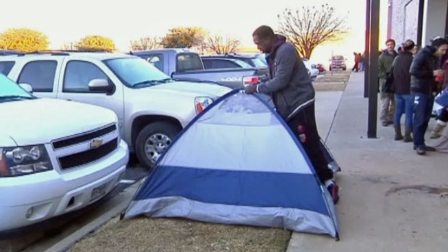 Parents and even grandparents set up camp outside the Grand Prairie Independent School District's administration building so that they could enroll their children in their school of choice Friday morning.