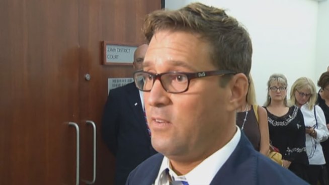 A former flight attendant can still make videos criticizing American Airlines after reaching a settlement with the airline Wednesday.