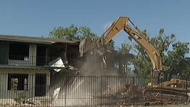 Leaders in Dallas hope leveling a neighborhood eyesore will help clean up the area around Fair Park. On Tuesday, demolition crews started taking down Grand Apartments on Grand Avenue.