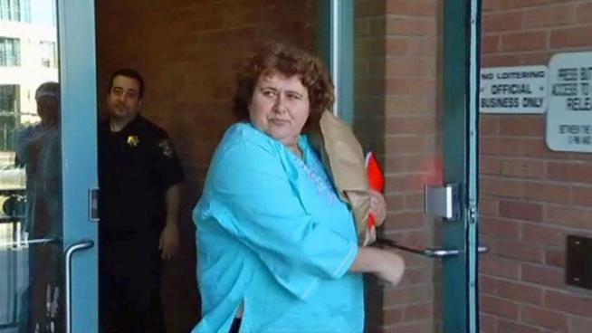 As the grandmother of a toddler mauled by dogs is released from jail, the 911 tapes after the attack are released.