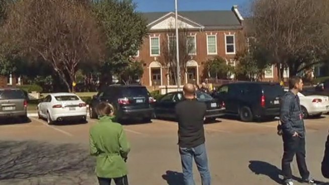 Students head back to Highland Park High School Thursday morning under tighter security and the watchful eyes of the Federal Bureau of Investigation.