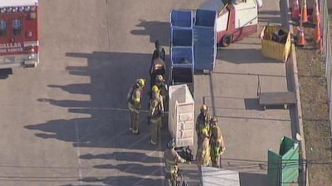 According to the Salvation Army, a volunteer picked up a glass container which broke and 5 people in the warehouse were overcome by fumes.