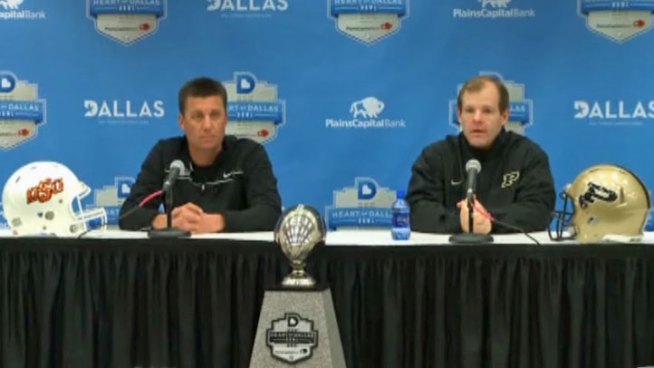 The Oklahoma State Cowboys take on the Purdue Boilermakers in the New Year's Day bowl game at the Cotton Bowl, the game has a new sponsor, and the Heart of Dallas Bowl gives back to the community.