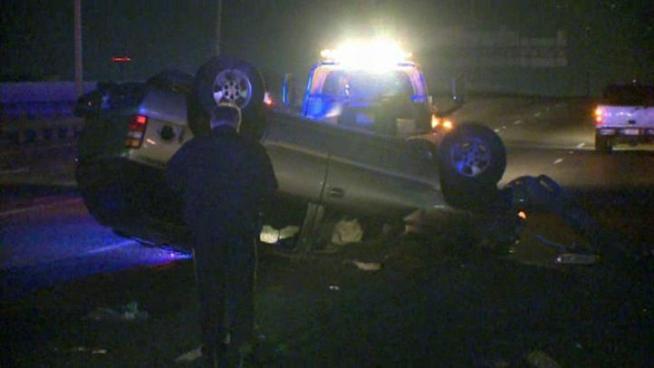 Dallas police were called to northbound Loop 12 where it joins northbound I-35E where officers found a Chevrolet Tahow on its roof. A woman was ejected and died, a man was taken to the hospital.