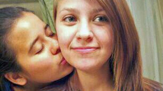 Dallas candlelight vigil is one of many planned across America for teenage lesbian couple shot near Corpus Christi. One woman died. Another survived.