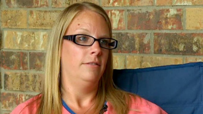 A Grapevine woman cited by police over using profanity at a free water park for children says she plans to fight the ticket in court.