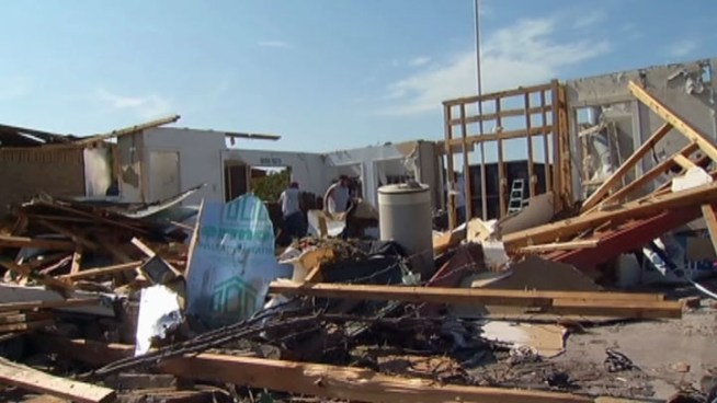 Residents in Lancaster are still cleaning up, repairing, and rebuilding one month after an EF2 tornado tore through their town April 3.