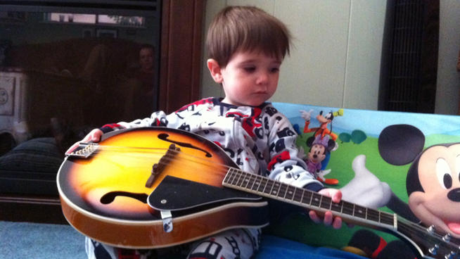 A neighbor rescued 2-year-old London Hewitt from a house fire in Richardson Tuesday morning.
