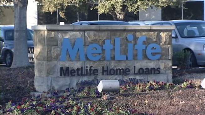 MetLife Bank says it will lay off hundreds of people in the coming months. 