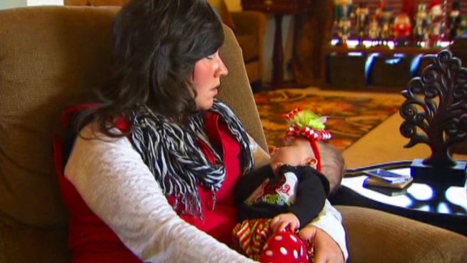 A woman survives a torn aorta and gets to spend Christmas with her newborn baby, 9-year-old, and husband.