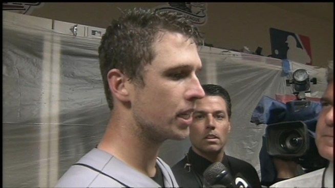 Matt Cain, Buster Posey and Pablo Sandoval celebrate the NLDS victory.