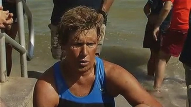 Diana Nyad swam a ceremonial final leg to shore in Key West Tuesday afternoon after ending her latest attempt to swim from Cuba to Florida earlier in the day. As soon as she walked onto the sand, a welcoming committee gathered on the beach sang 