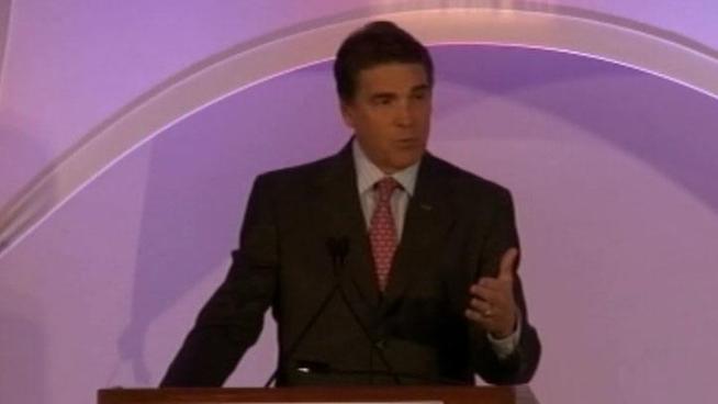 Gov. Rick Perry took a low-key style when he addressed the Georgia Public Police Foundation, an Atlanta-based conservative think tank.