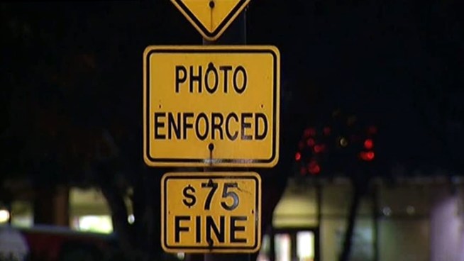 A Plano resident is circulating a petition in an effort to overturn the city's red-light-camera ordinance.