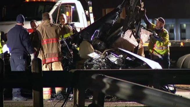 Two people were found dead inside a car submerged in a canal in Las Colinas, police said.