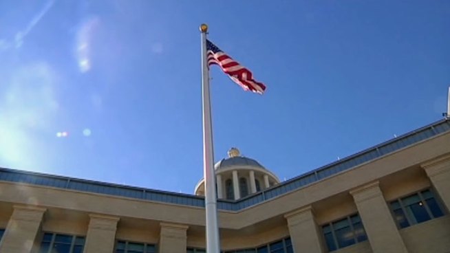 Rockwall County commissioner Jerry Wimpee stepped down amid the controversy over reducing the size of the flagpole flying the U.S. flag at the Veteran's Memorial outside the Rockwall County Courthouse.