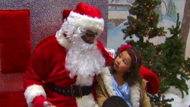 Santa was on hand as thousands of children and adults got clothes, shoes, food, toys and more.
